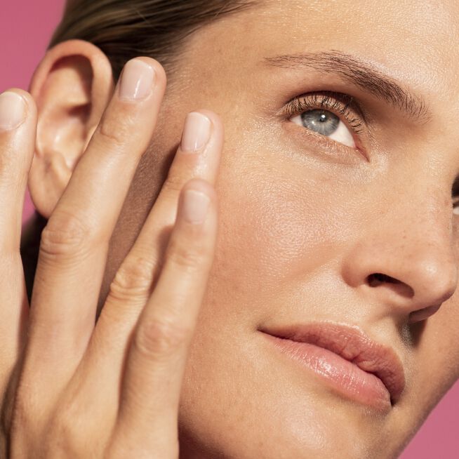 Woman after using the Get Luminous & Lifted Set