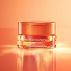 Pro Glowfoliant™ Mix-In Microderm Crystals on orange background